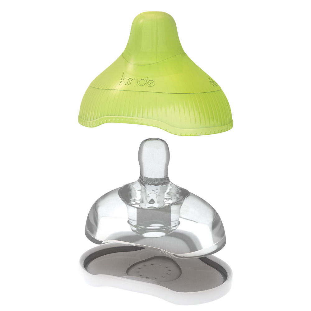 Drei Teile eines Babyflaschensaugers mit grünem Deckel